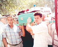 Başkanın babası Remzi Doğan'ın cenazesi belde mezarlığında toprağa verildi.