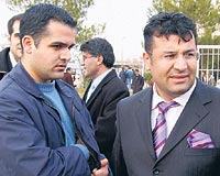 Fidann olu (solda) avukat Mustafa Alada ile birlikte. 