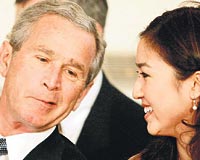 Bush, in asll buz pateni ampiyonu Michelle Kwandan gzlerini alamad.