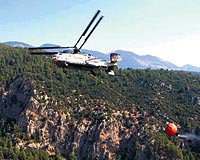 Antalyann Ka ilesinde Milli Parklara bal alanda devam eden yangna helikopterlerle mdahale ediliyor.