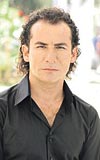 G��er �ark�lar�m� okuyarak kalbime bir han�er soktu